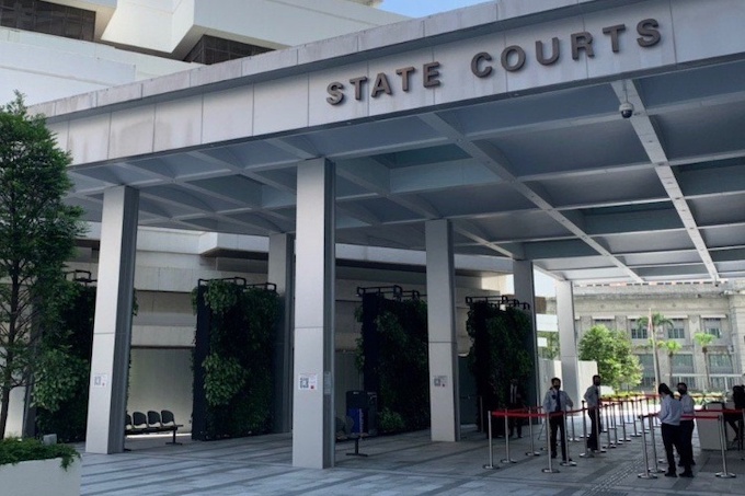 Envy director charged with fraud; at least S$1b invested in his 2 firms