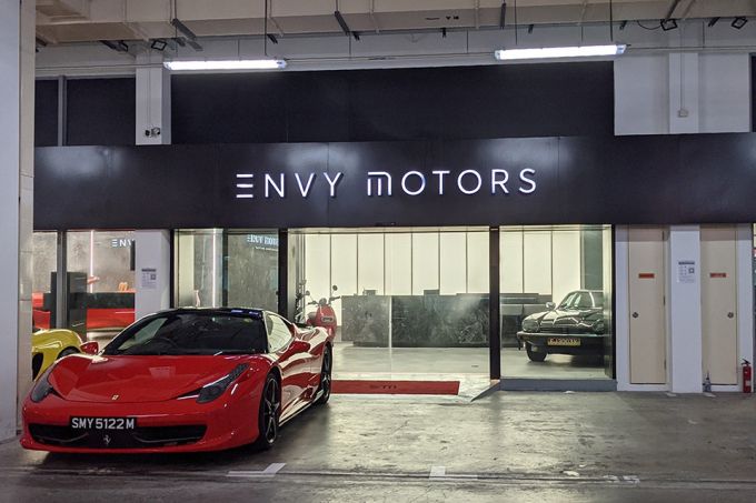 Envy director charged with cheating and fraud has links to vehicle firms