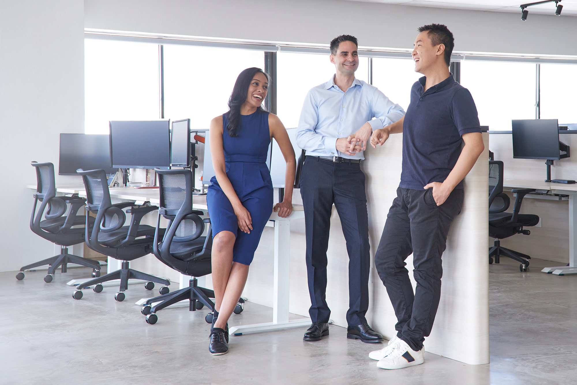 Photo of Handshakes staff talking